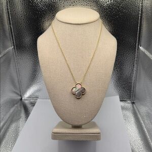 Elegant Gold and Black Clover Pendant Necklace